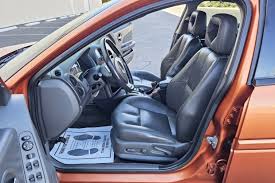 Image result for Sunburst Orange 2004 Pontiac