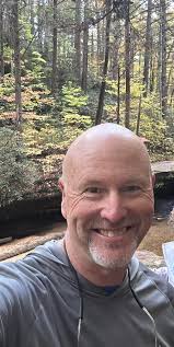 Hi all! I just wanted to introduce myself and share a photo I took. This is  my wife Molly& I having fun in the UP!