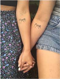 Next, we have another matching tattoo design. 50 Matching Sister Tattoos For 2 3 2021 Unique Ideas With Brother