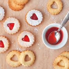 I saw these beautiful austrian crescent cookies recipe for the very first time here. Top View Of Traditional Christmas Linzer Cookies Filled With Strawberry Jam On Wooden Board These Are Traditional Austrian Filled Bisquits Image Stock By Pixlr