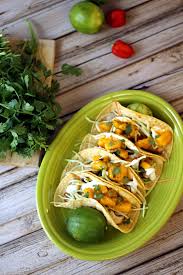 In a medium bowl, combine the pineapple, mango, red onion, scallions, jalapeño, cilantro, chives, and lime juice. Top 10 Fish Tacos Rainbow Delicious