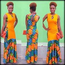 Get robes loungewear delivered to your door. Robe Longue Tissu Pagne African Fashion African Clothing Styles African Print Clothing
