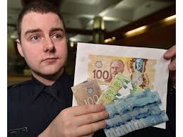 Three charged in connection to fake hundred dollar bills