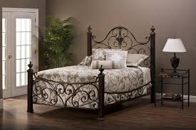 Construction bed has wrought iron headboard and footboard and bun feet. Elegant Wrought Iron Bed Frames Home Design Ideas By Matthew