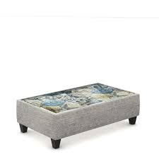 With a c shaped bent glass frame and a tempered glass shelf, the waterfall bent glass coffee table with storage shelf is once an art piece and a highly functional coffee table. Holland Park Glass Top Ottoman Coffee Table