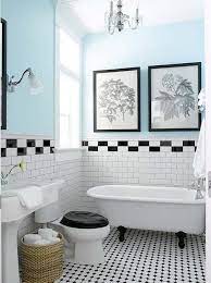 Decorative border tile surrounds a mirror, hanging over a white sink in glamour style. 37 Ideas To Use All 4 Bahtroom Border Tile Types Digsdigs