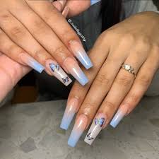 This nail design is a combination of orange and white. Pink Butterfly Nail Art And Glitter Blue Ombre Nails Long Acrylic Nails Ombre Acrylic Nails