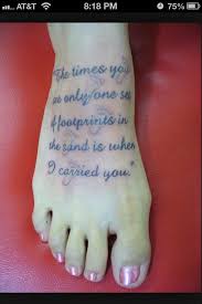 If you want to make a tattoo, look how it looks from other people! Footprints In The Sand Tattoo With Cross Footprints In The Sand Footprints In The Sand Tattoo Classy Tattoos Foot Tattoos