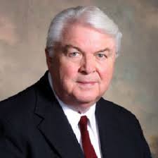 Young Moore Mourns Loss of Robert M. Clay