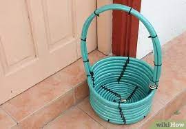 Bend the hose's end in a gentle curve across the width of the basket's opening to create a handle. 3 Ways To Make A Basket From A Garden Hose Wikihow