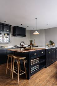 Black And Copper Kitchen Cabinets A Beautiful Devol Kitchen Featuring Black Painted Cupboards And Deep Grey Walls Kitchen Cabinet Trends Kitchen Inspirations Kitchen Cabinet Colors