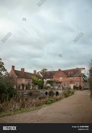 The sky is a little bluer. Flatford Mill Building Image Photo Free Trial Bigstock