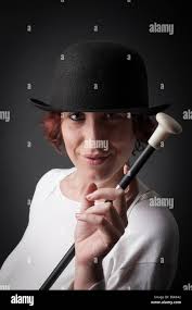 Bowler hat and cane hi-res stock photography and images