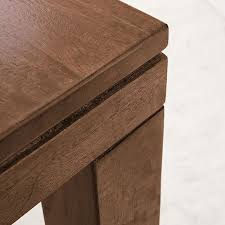 Lounge in comfort with the color, shape, and accent pillows of your choice. Canyon Solid Wood Dining Table