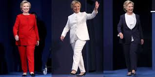 When was the last time you saw either wear a dress to enhance their feminine image? Hillary Clinton Wore Red White And Blue For Her Debate Pantsuits