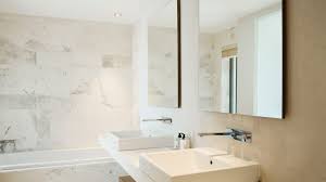 Wooden mirrors will look good in a traditional themed room; 13 Beautiful Mirrored Bathrooms