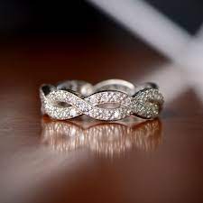 Rochelle Infinity Band Platinum And Diamond Infinity Band Diamond Infinity Band Infinity Wedding Band Antique Engagement Ring Art Deco