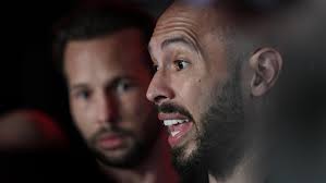 Tate brothers back in Romania to 'prove their innocence'