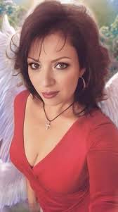 How to change the shirt color of a person in a photo to white or something  lighter and make it more conservative?