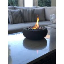 You may safely use this product indoors or outdoors, because it produces no obnoxious fumes or odors. Stone Gel Outdoor Tabletop Fireplace Fire Bowls Tabletop Fireplaces Fire Pit