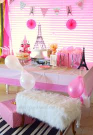 This parisian 1st birthday party features pink floral arrangements, a dessert bar and even a live caricaturist. Paris Themed Birthday Party Craft O Maniac