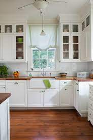 Stained oak cabinets give this cooking space a touch of rugged appeal. Reasons To Install Butcher Block Counter Tops Town Country Living