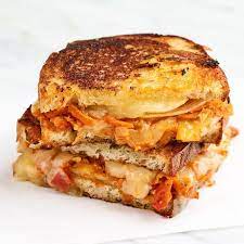 Chakalaka And Cheddar Braaibroodjies Grilled Cheese Sandwiches Recipe In 2021 Cheese Sandwiches Grilled Cheese Sandwich Sandwiches