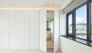 Foregoing the standard shower door creates a seamless entrance into the shower. Your Best Options When Choosing A Bathroom Door Type