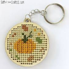 Like most stitchers, i have a huge collection of purchased patterns, but i take great delight in finding new free charts. Pumpkin Cross Stitch Free Mini Design Sum Of Their Stories Craft Blog
