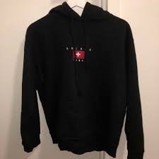 Evelyne chetrite, along with husband didier, founded sandro in 1984 drawing inspiration from her colorful childhood in morocco and years spent immersed in the vintage shops of paris. Brandy Melville Tops Christy Suisse 984 Hoodie Poshmark