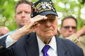 John Roman, WWII veteran, 30th Infantry Division, salutes