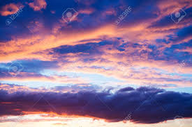Download sunset sky stock photos. Stunning Beautiful Sky At Dusk Or Dawn With Sunlit Clouds Fiery Stock Photo Picture And Royalty Free Image Image 121678919