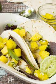 Nigella's fish tacos are excellent, and much easier than you might think. Fish Tacos With Mango Coconut Lime Salsa Call Me Pmc