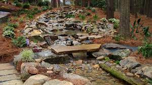 Man Made Mountain Stream With Pond Patio Fire Pit Playground Plants And Pathways Backyard Stream Backyard Water Feature Backyard
