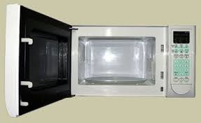 Fill A Microwaveable Dish Or Cup With Just Over A Cup Of Water Squeeze The Juice Of A Lemon Into The Water Place Container Microwave Microwave Oven Cleaning