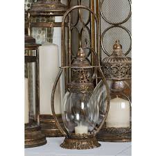 Shop for candles and candle holders on wayfair.com! Litton Lane Tarnished Brass Candle Lantern With Handle 29558 The Home Depot Candle Lanterns Brass Candle Lanterns Lantern Decor Living
