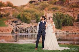 Wedding Couple In Front Of Waterfall At Dragonridge Country Club Las Vegas Wedd In 2021 Las Vegas Wedding Photographers Las Vegas Wedding Venue Las Vegas Photographers