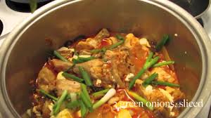 Divide rice among 4 bowls. Korean Simmered Chicken And Kimchi Kimchi Jjigae Recipe Youtube