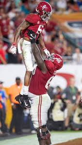 Devonta smith is the first wide receiver to win the heisman trophy since 1991.credit.tom pennington/getty smith, a senior, was the first wide receiver to earn the heisman since 1991, when desmond 19, two days before the heisman voting deadline, he logged 15 catches, a southeastern. Alabama Wide Receiver Devonta Smith 6 Is Lifted After A Touchdown Catch In Second Half Action Of T Alabama Crimson Tide Football Alabama Crimson Tide Alabama