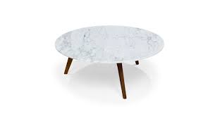 If you are looking to make a statement, marble tables will bring a high level of sophistication to any space. Stained Walnut Marble Round Coffee Table Mara Article