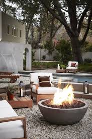 Step Inside A Casual And Comfortable L A Home Backyard Fire Rustic Fire Pits Backyard Landscaping Designs