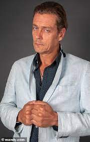 He was popularly known in the country for his role as a police sergeant in a famous tv series named 'peaky blinders.' F9ht99 Ub3yjxm