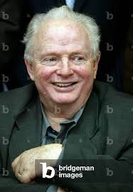 Image of Nazi Holocaust survivor Yosef "Tommy" Lapid of Shinui Party smiles