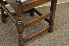 Painted in a weathered wood technique and naturally stained legs and top, she is definitely one of a kind! Set Of Eight Solid Carved Oak 1930s Jacobean Or Gothic Style Dining Room Chairs For Sale At 1stdibs