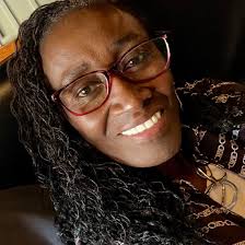 Staff Sgts. Gerald Richardson and James Sinkler made a new friend while at  lunch. Kare, 4, seemed drawn to their uniforms and equipment. He received  his own gear, police stickers and a