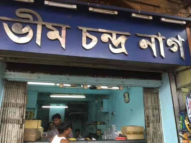 The historic entrance of Bhim Chandra Nag, AI generated
