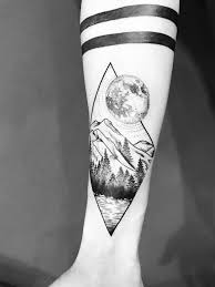 Simple mountain tattoo the best way to illustrate overcoming obstacles is to compare them to climbing the world's highest mountains. Mountain Tree Moon Tattoo Diamond Dot Work Moon Tattoo Mountain Tattoo Landscape Tattoo