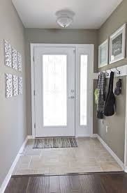 Simple Entryway I Want A Door With Glass That Lets Natural Light Into My Dark Hallway But That People Can T See Into Home Entryway Flooring Home Decor