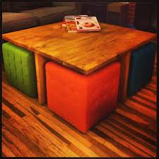 Whimsical cushioned stool with a mushroom shape, upholstered with a cap seat in a floral design, set on a round velvet base, perfect for using as. Coffee Table With Ottoman Seating Ideas On Foter