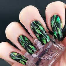 Professionally performed and dark nail designs pattern on nails can be done not only with the help this manicure tool is ideal for dark nail designs and for use at home. 42 Halloween Nail Art Ideas Cute Halloween Nail Designs Allure